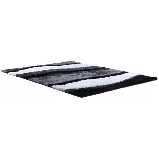 Tapis shaggy à poils longs ECUME - tufté main - Noir et Blanc - 200 x 290 cm